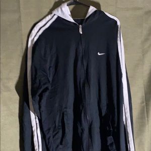 Used black and white Nike zip up